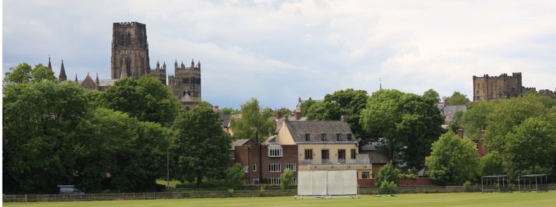 Cricket field with views of 达勒姆 Cathedral and castle behind