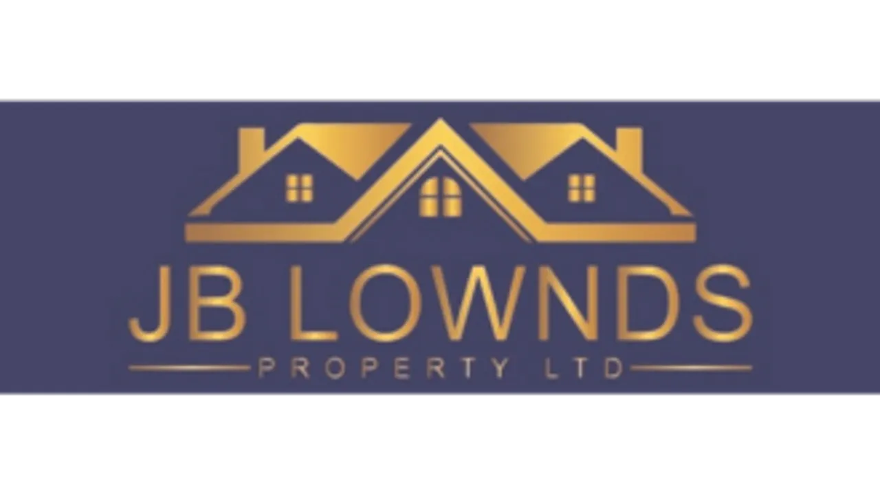 The logo for JB Lownds estate agents, with their name in gold underneath the outline of the roofs of a row of houses