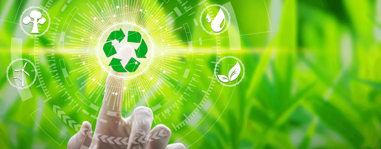 Hand touching virtual renewable energy screen with background of grass