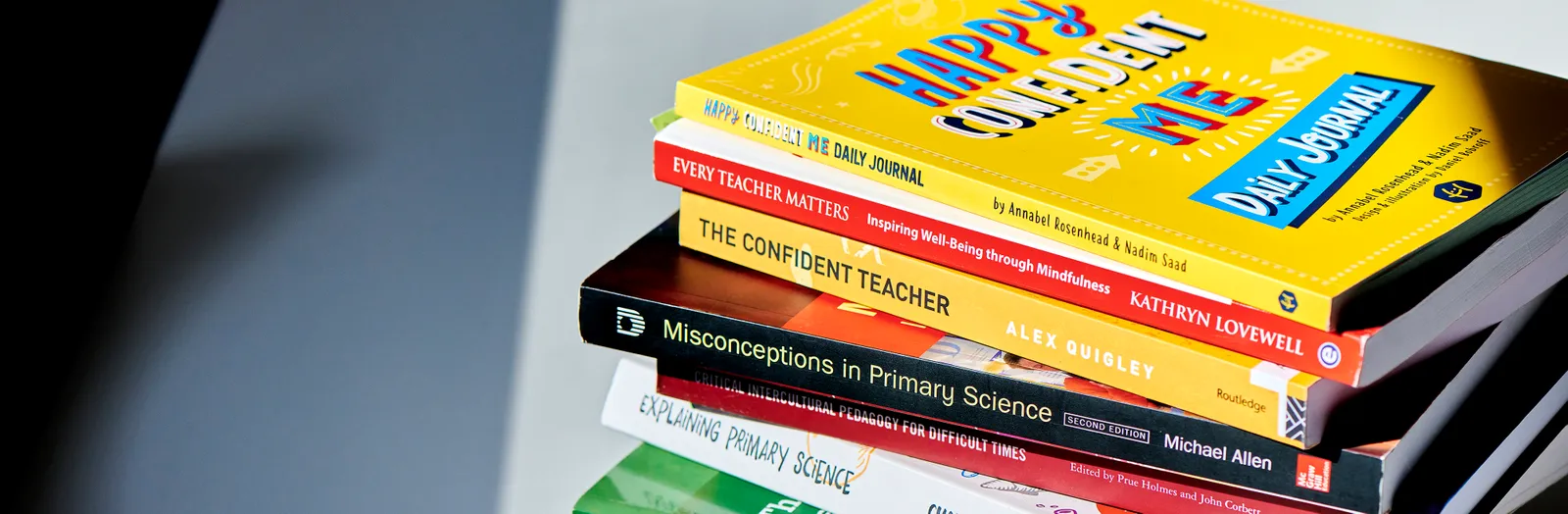 Stack of books on education