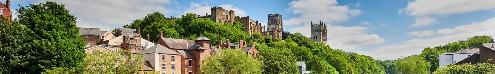 View of Durham Castle, Durham Cathedral and Framwellgate Bridge across the river