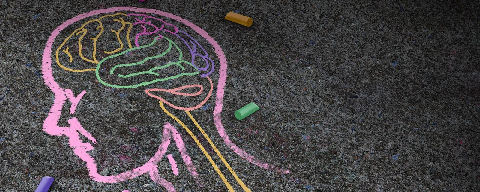A chalk outline of a human head on a footpath