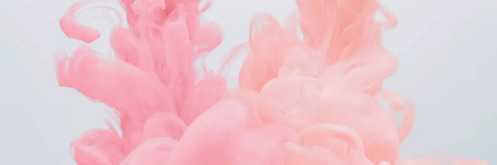 A digital illustration of pink plumes of smoke