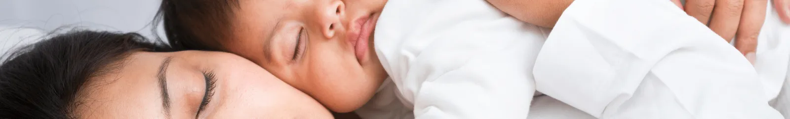 Mother and baby sleeping