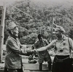 MacDonald with his adopted father Temenggong Koh, Paramount Chief of the Iban tribe.