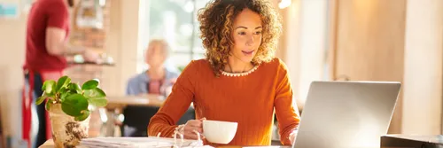 Business woman working from cafe