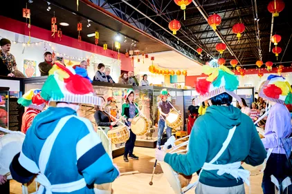 Traditional Korean drumming performance in gallery