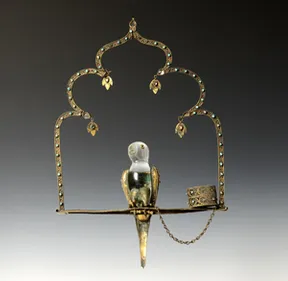 Crystal bird on perch