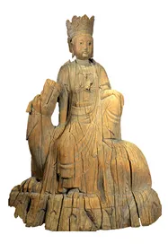 A wooden carving of the Buddhist figure of Guanyin