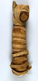 Image of an a mummified cat from Ancient Egypt, bound in bandages.