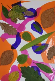 Image of leaves and coloured patterns stuck to a sheet of paper
