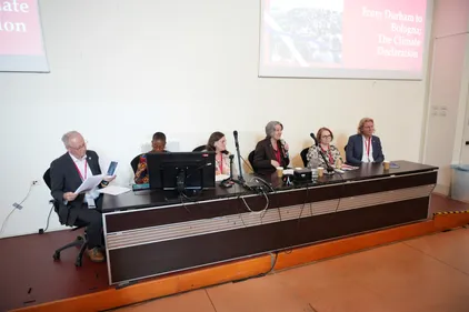 a group of people sitting at a table