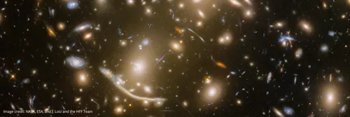 Image from the James Web Space Telescope showing newly discovered stars in the distant Dragon Arc galaxy