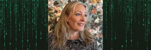 Professor Louise Amoore wearing a black and white top smiling with a green code background