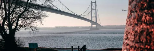 The Humber Suspension Bridge spans over the River Humber.