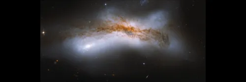 A graphic depicting a collision between Milky Way and Andromeda