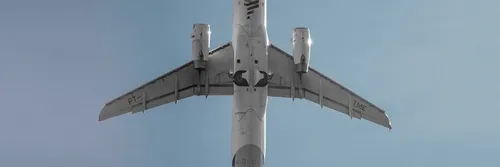 Underneath airplane in flight