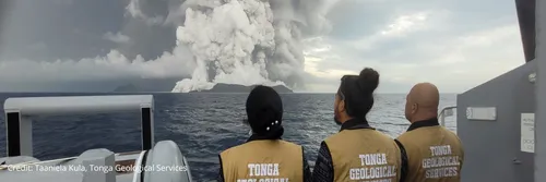 Members of Tonga Geological Services watch a volcanic eruption from a boat. Image credit Taniela Kula, Tonga Geological Services