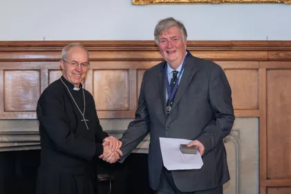 David Wilkinson shakes hands with Archbishop Welby