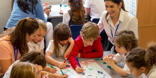 Teacher with School Children