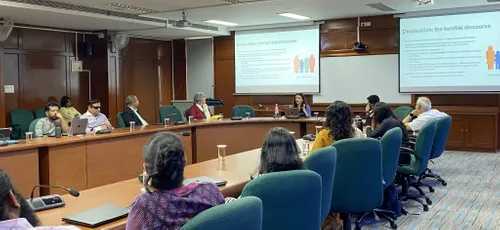 Dr Natalie Sedacca India presenting to a group of people