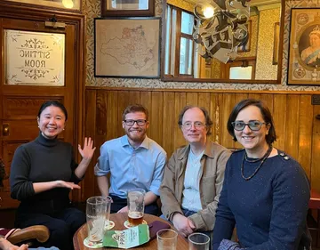 Angus celebrating with internal examiner Dr Amanda Hsieh (left), and PhD supervisors Professor Julian Horton and Dr Katherine Hambridge (right)