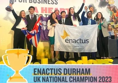 Enactus Durham National Champions 2023, winning team celebrating with trophy