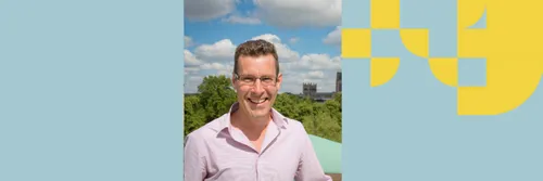 Professor Simon Cornish is pictured against the background of Durham Cathedral in the distance