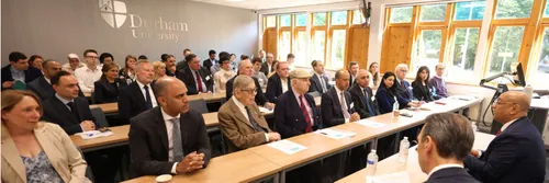 Conference delegates hearing from His Excellency Jasem al-Budaiwi