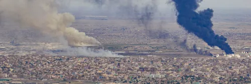 An aerial photo showing fires of fuel and ammunition warehouses in the Jabra area south of the Sudanese capital Khartoum