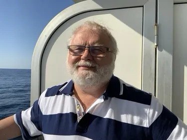 Professor Jon Gluyas aboard cruise ship