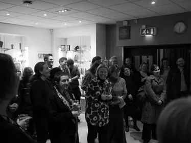 Photograph of attendees enjoying a talk at the Voices in Psychosis Launch at the Oriental Museum, Durham.