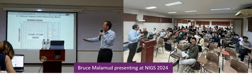 Bruce Malamud presenting in front of a group