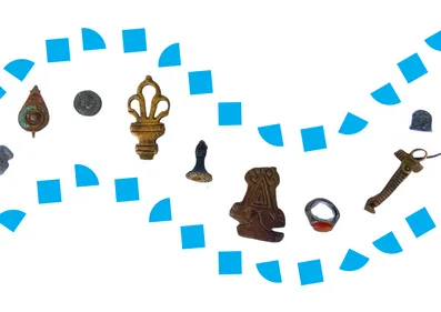 range of small objects surrounded by blue shapes to denote a river