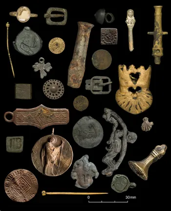 A selection of archaeological artefacts on a black background