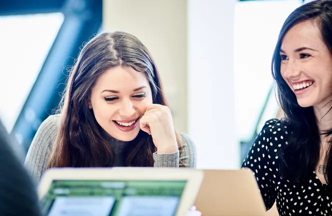 Photos of students in the Law School lecture theatre, moot court room and study areas