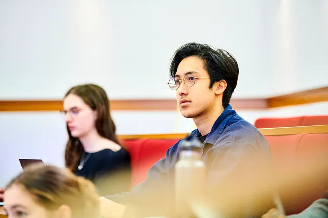 Focused students in a lecture hall
