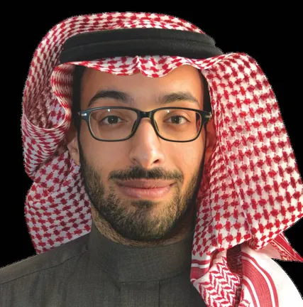 A headshot of Mohammed Al Sudairi smiling wearing a headscarf