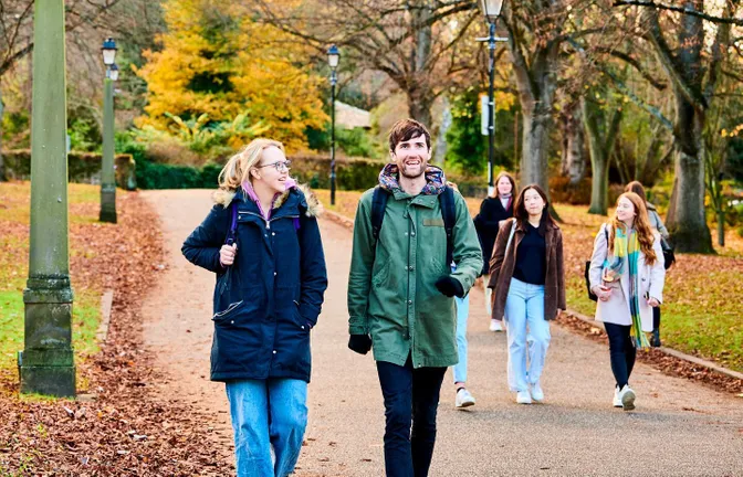 Students walking outside St Mary's College in autumn
