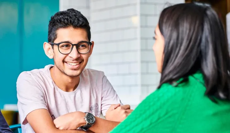 Two students in Kingsgate Bar socialising