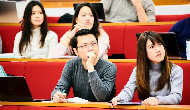 Students listening intently during a seminar