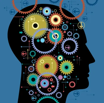 Head showing brain visual with cogs