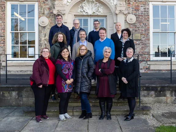 IAS staff and Fellows outside Cosin's Hall