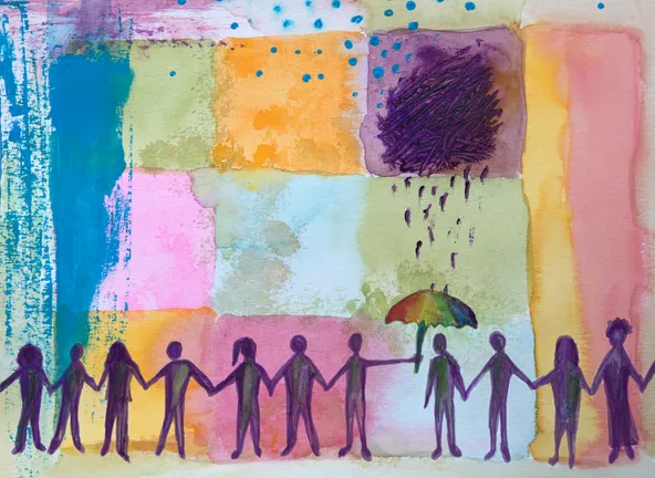 People holding hands and offering assistance to a person in need. Concept of care, emotional support. (courtesy of stellalevi on iStock)