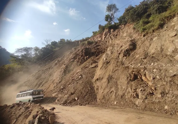 Rocky Roads in Nepal, with rock partially covering the road