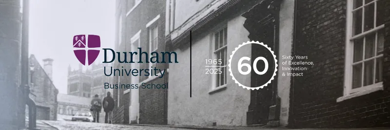 view from the bottom of Owengate street in the 1960s with the 60 anniversary business school logo