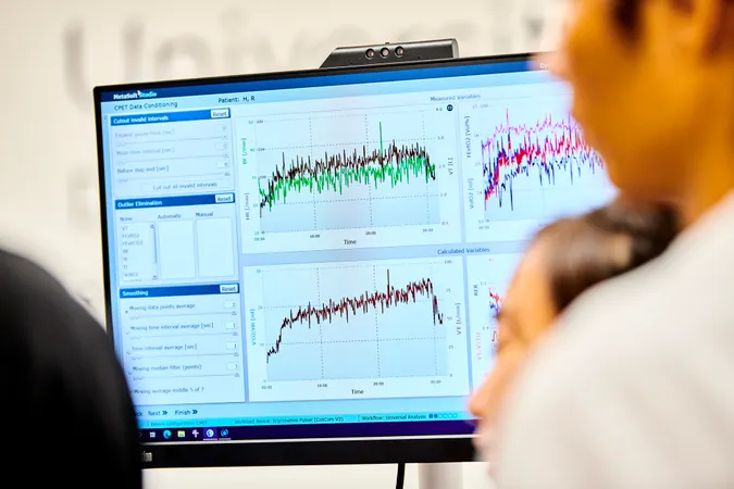 People analysing data on a computer screen