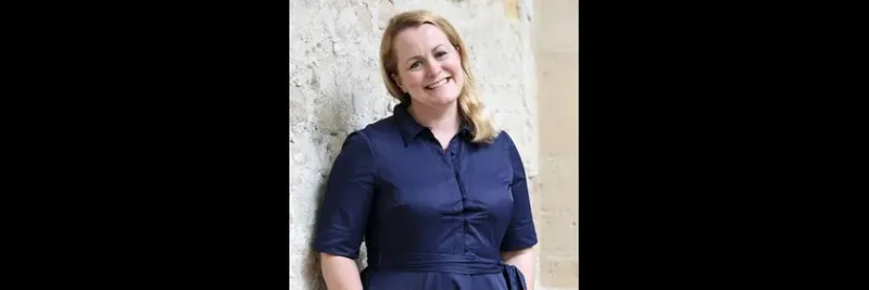 Woman smiling looking at camera