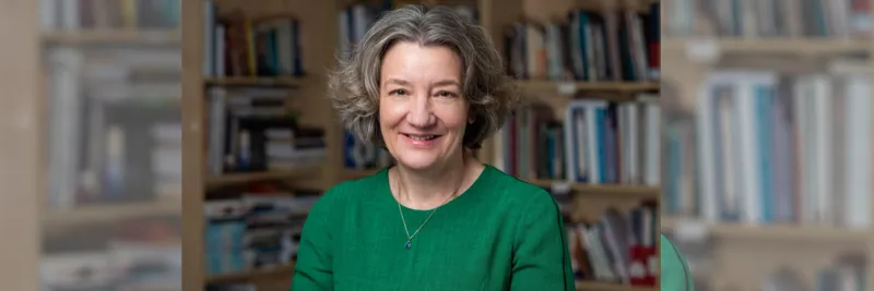 Vice Chancellor Karen O'Brien wearing a green top smiling at the camera