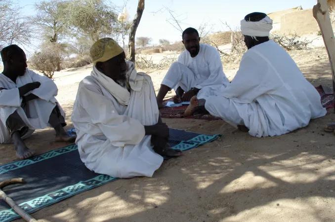 Men sitting in a group